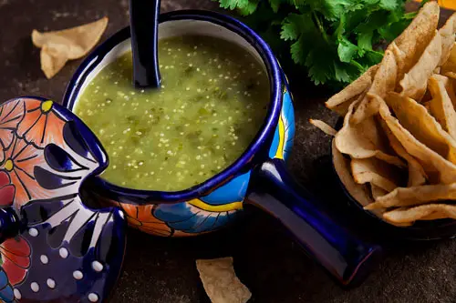 Green Salsa accompanied with tortilla chips