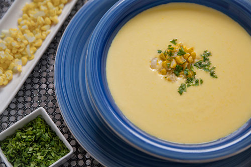 Cream of Corn Soup garnished with coriander and golden corn