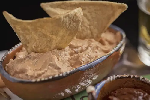 The Chipotle Cream Cheese Dip accompanied with tortilla chips
