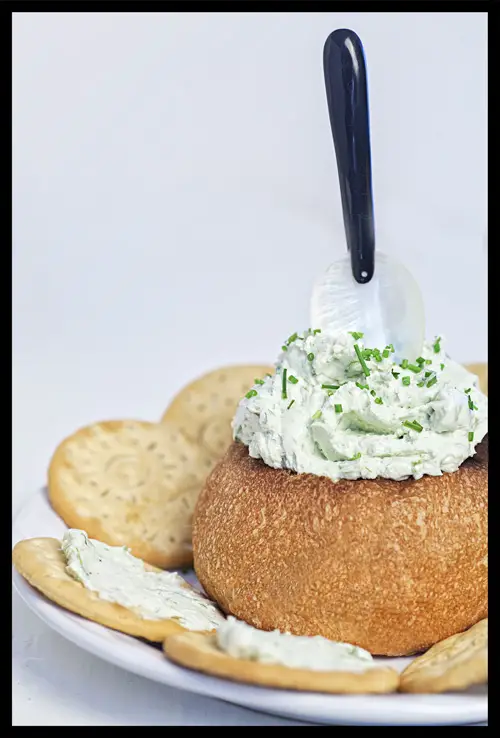 Three Cheese and Herbs Dip served with bread and crackers
