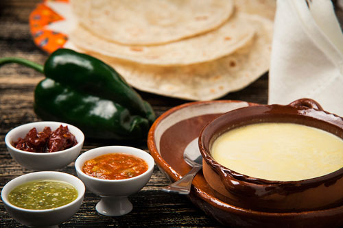 Natural Melted Cheese with flour tortillas and salsas